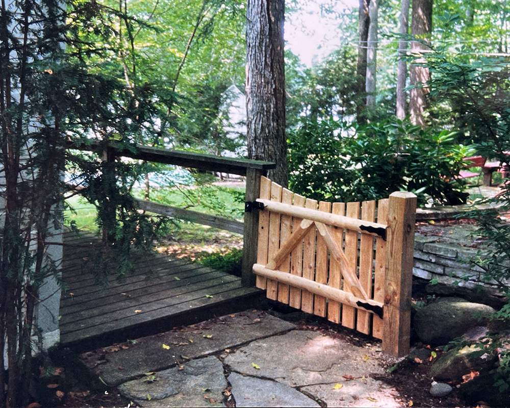 A custom wood gate in Northampton by Superior Fence Contractors